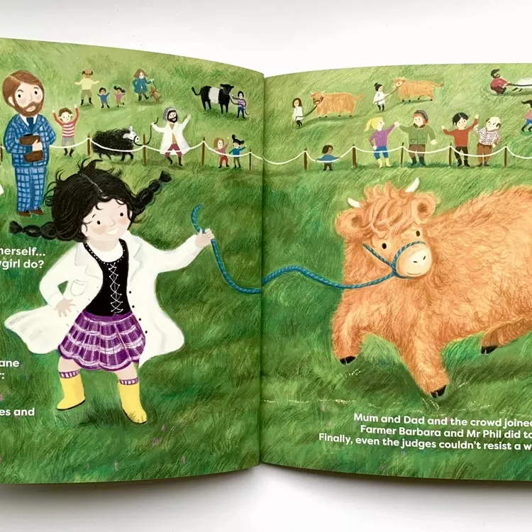 an illustration of Hanna and Calamity Jane the highland calf dancing together in the show ring.